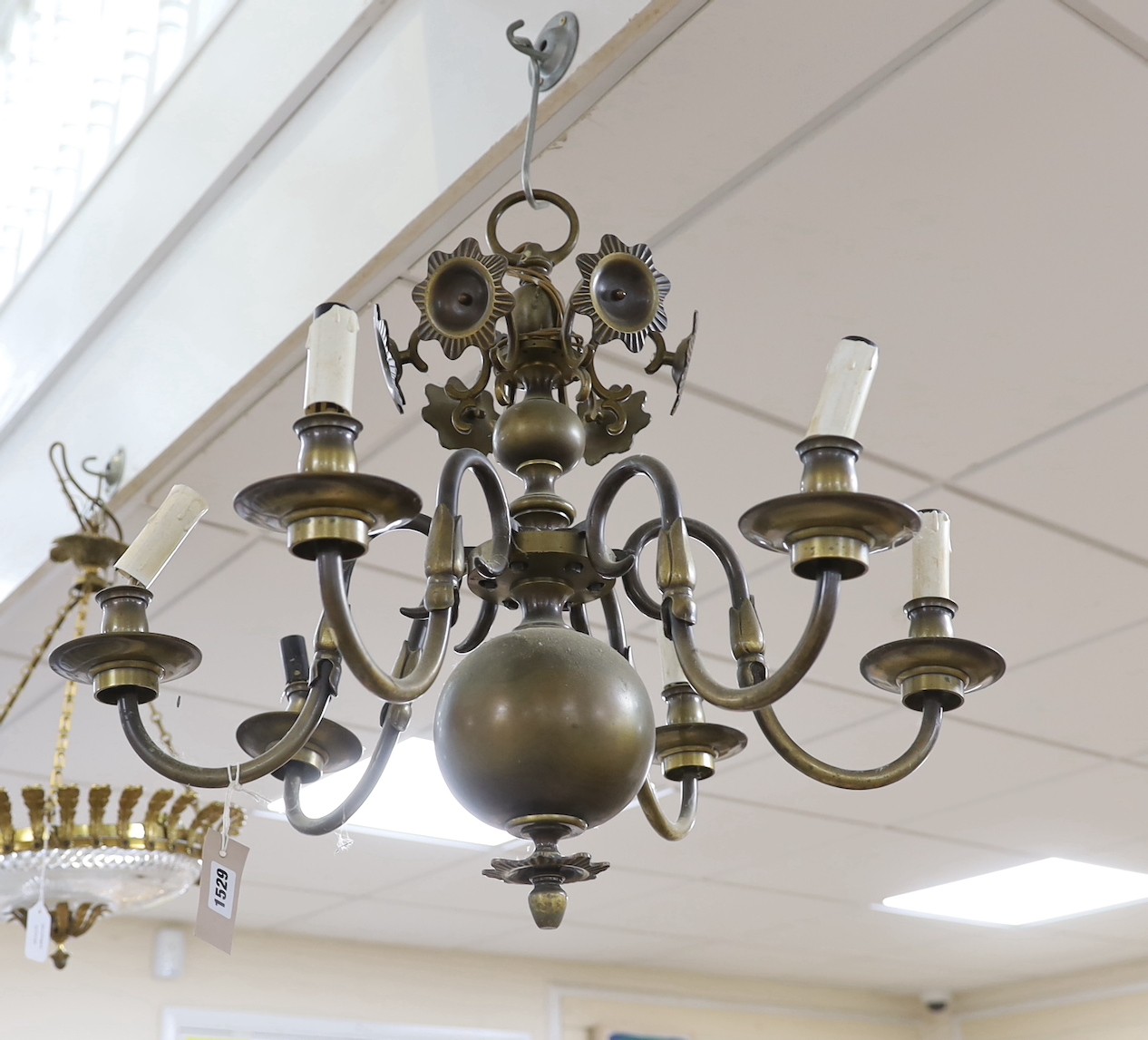 A cast brass six branch electrolier, 45cms high.